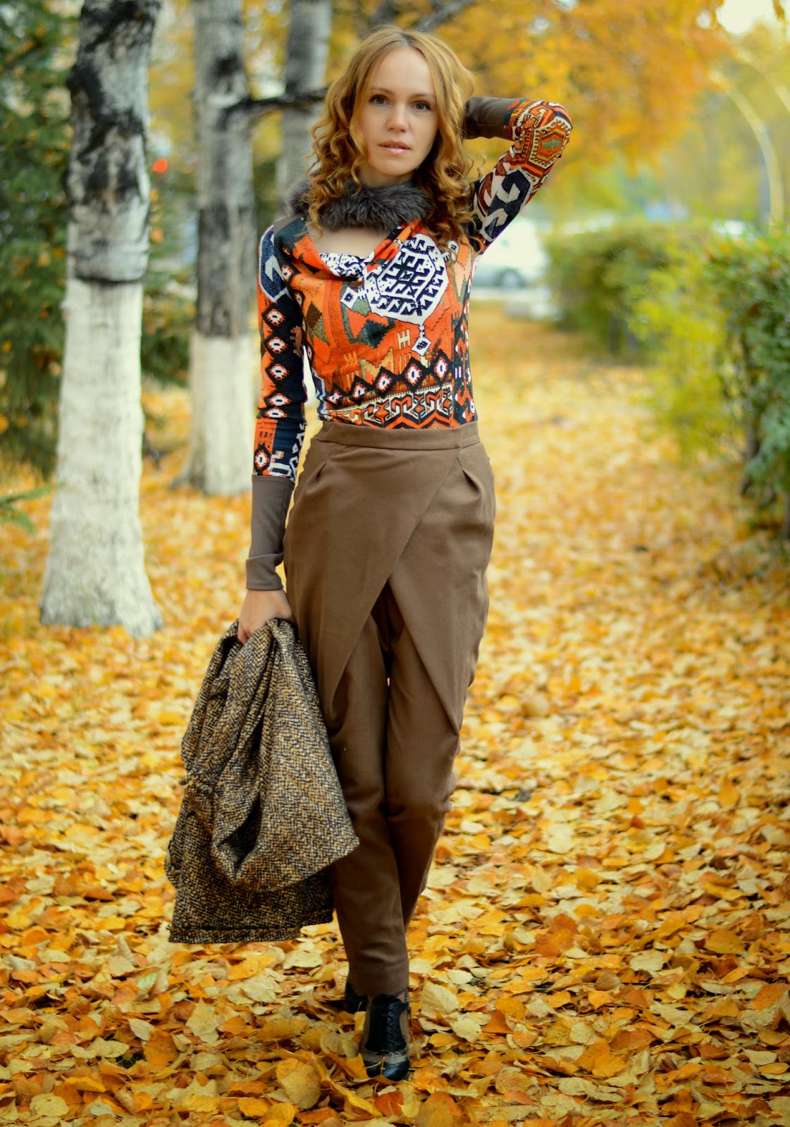 Длинный жилет