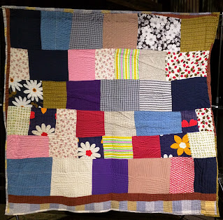 One-patch quilt of randomly sized rectangles.