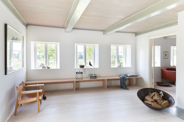Magnificent minimal decor in a European farmhouse with Douglas fir floors on Hello Lovely Studio