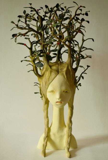 Yui Ishibari esculturas surreais perturbadoras crianças tomadas por plantas natureza bizarra