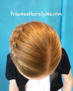 stacked waterfall braid side ponytail