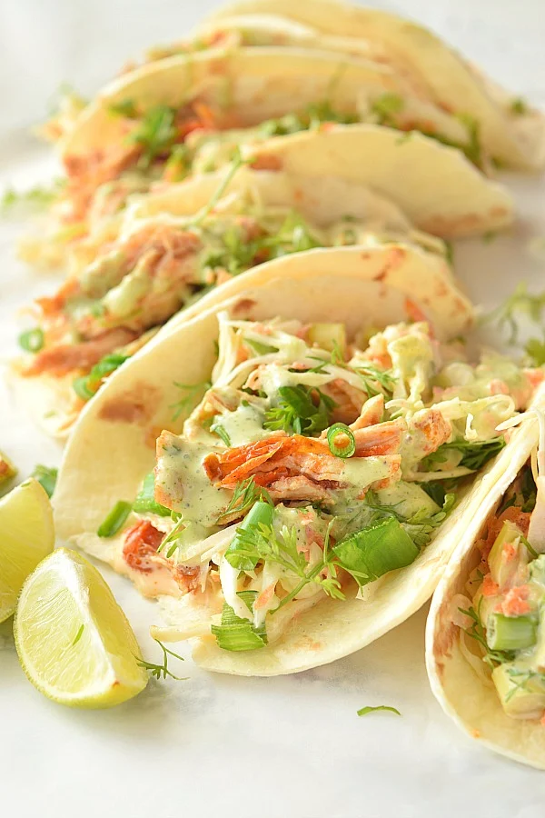 Tacos with grilled chicken,slaw and creamy cilantro lime sauce