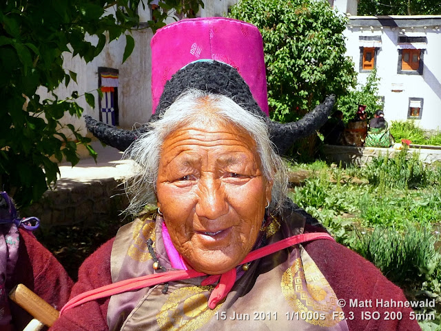 people, portrait, street portrait, headshot, Leh, Northern India, Ladakh, old Ladakhi woman, traditional Ladakhi hat, traditional Ladakhi costume, silk apron, goncha, Facing the World, © Matt Hahnewald