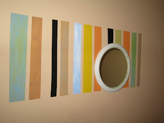 stripes painted on a wall mirror