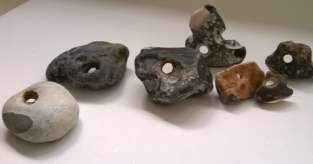 Inexplicable DeVice Holes with stones around them...