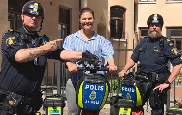 Crown Princess Victoria met police officers riding Segways in Södermalm