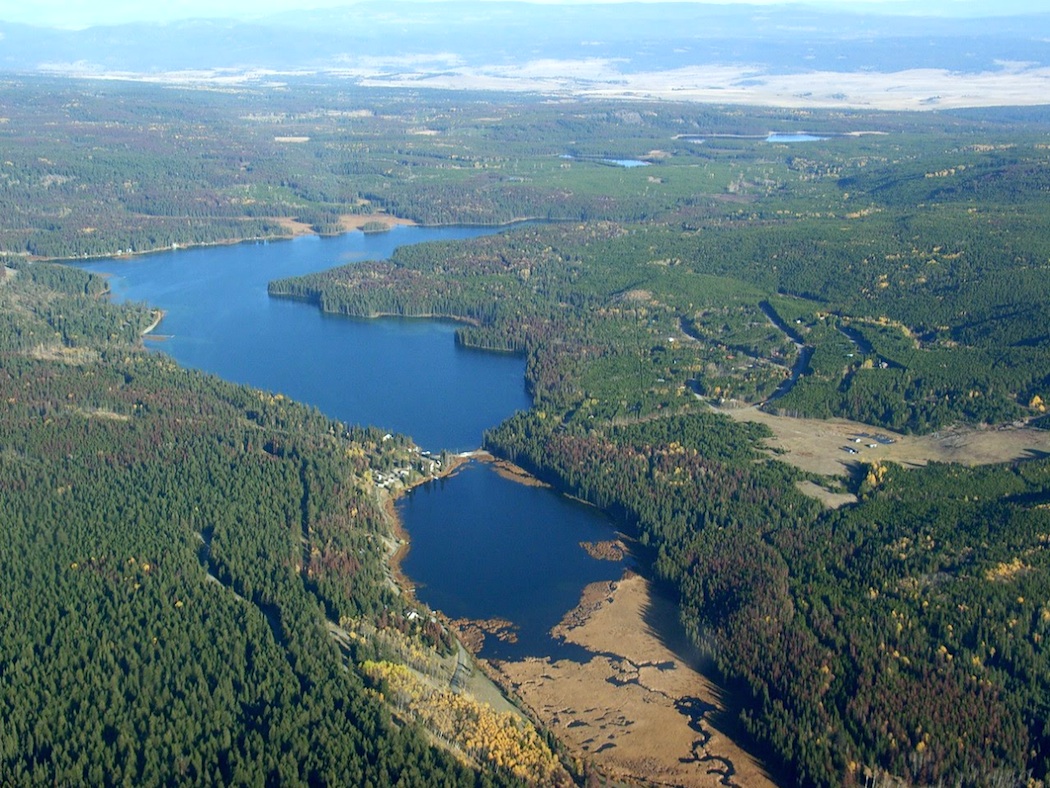 A drifting cowboy Canoe Fishing Dawn Glow Pond