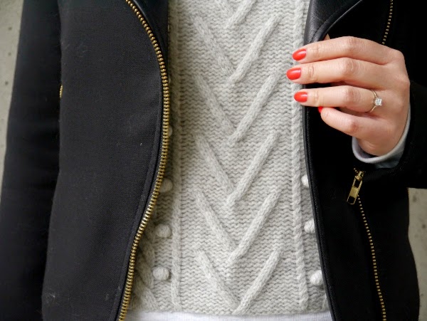 Coral nails, moto jacket and cable knit pom pom sweatshirt