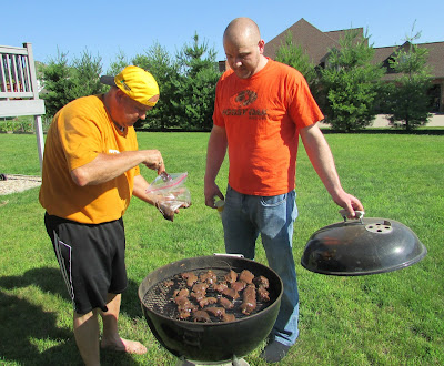 This Korean BBQ style venison backstrap is our absolute favorite way to enjoy venison. You can also use the marinade on steaks or thinly sliced beef for a more traditional take. Pops and KC putting backstrap pieces on the grill
