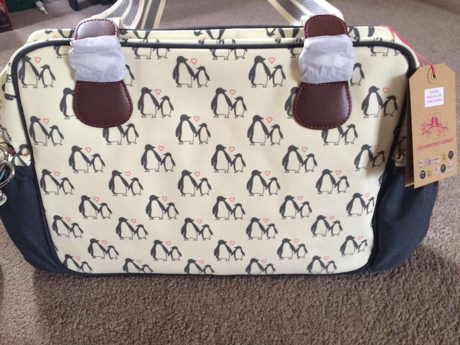 yummy mummy penguin changing bag