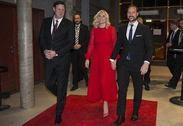 Crown Princess Mette-Marit wore red dress and  Nicholas Kirkwood Lace Pumps. at Olympic Amphitheater