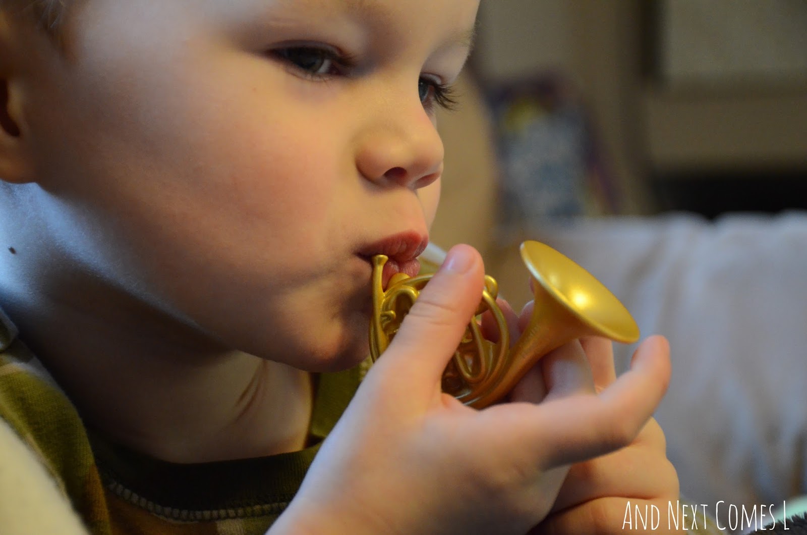 J playing French Horn from And Next Comes L
