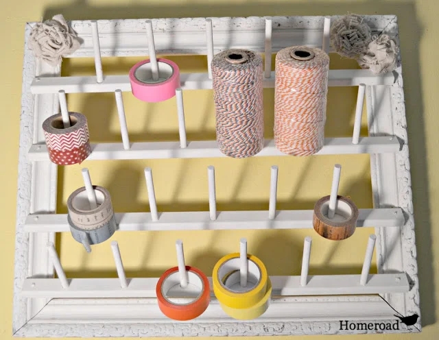 Easy to make AND pretty picture frame washi tape and twine organizer, by Homeroad, featured on I Love That Junk