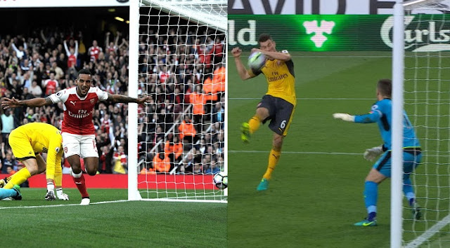Walcott's brace and Koscielny's handball goal shot Gunners to the top. walcott koscielny arsenal burnley swansea
