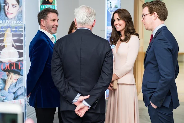 Kate Middleton visits the 'Vogue 100' exhibition. Kate Middleton wore her Alexander McQueen Wool and Cashmere Blend Dress