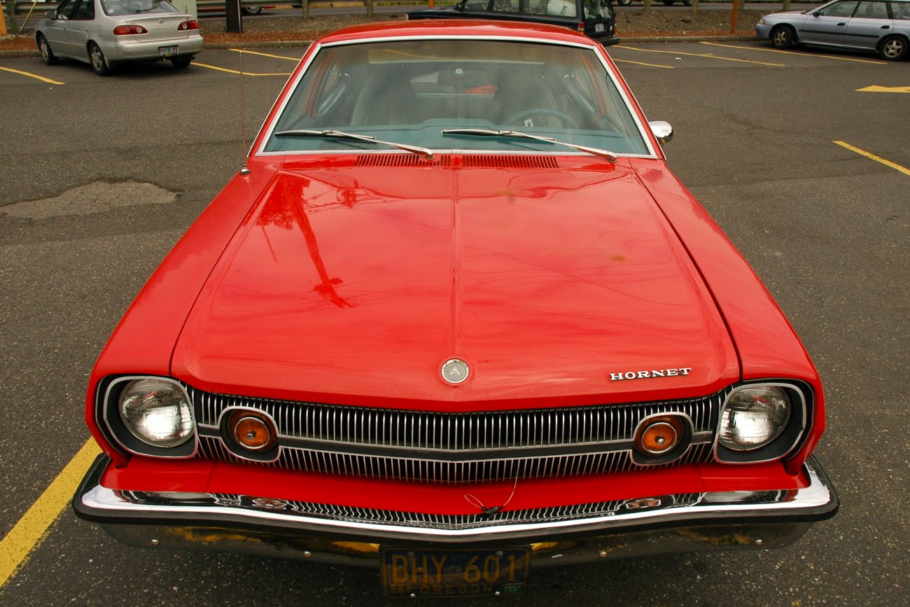 OLD PARKED CARS.: 1973 AMC Hornet Hatchback.