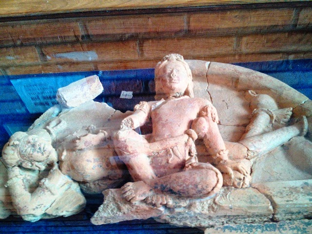 Terracotta sculpture of Siddhartha renunciating the material world, besides is his wife Yashodhara and new born son Rahul