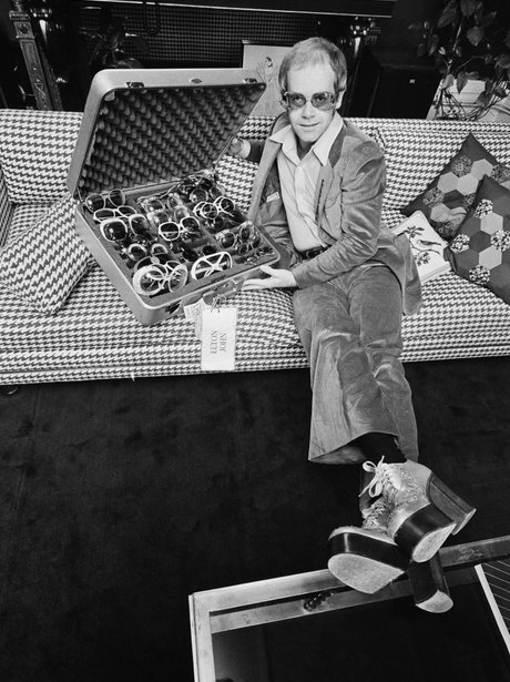 Elton John wear a platform shoe.