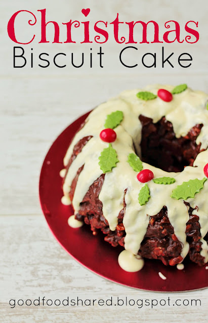 Christmas No Bake Chocolate Wreath Cake. Crumbled biscuits, nuts and dried fruit in melted chocolate! The perfect centrepiece. GoodfoodShared.blogspot.com  