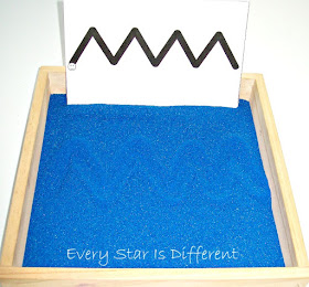 Shark themed prewriting sand tray activity