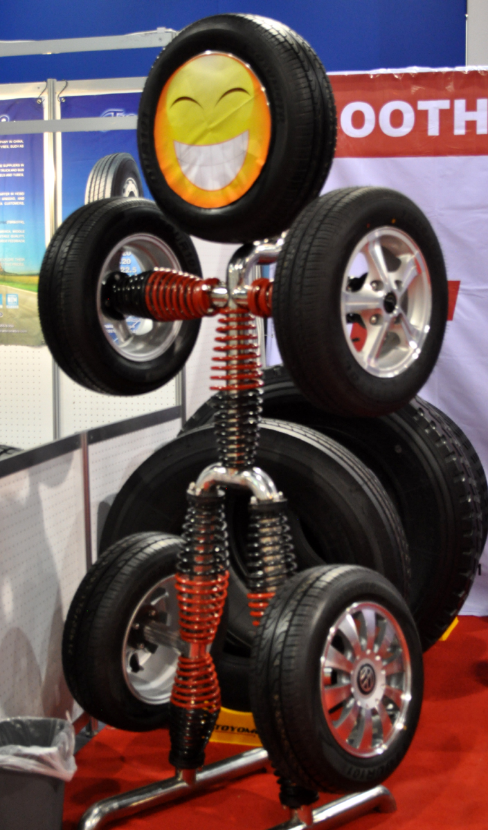 Just A Car Guy: clever tire and rim display at SEMA