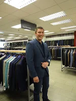 man being fitted for suit in glasgow slaters 