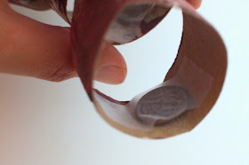 tape coins inside body parts