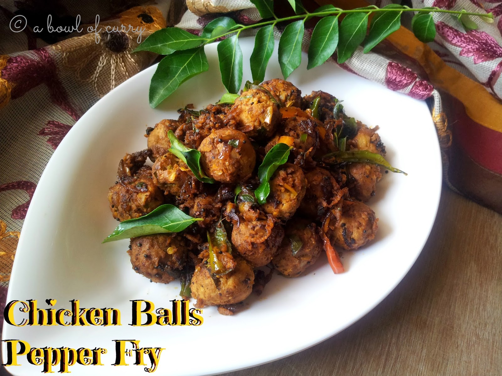 A Bowl Of Curry Chicken Balls Pepper Fry