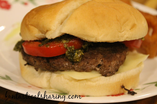 Pesto Burgers // This variation doesn't add any time to making a burger, but it sure does blow a regular burger right out of the water! #recipe #burger #pesto