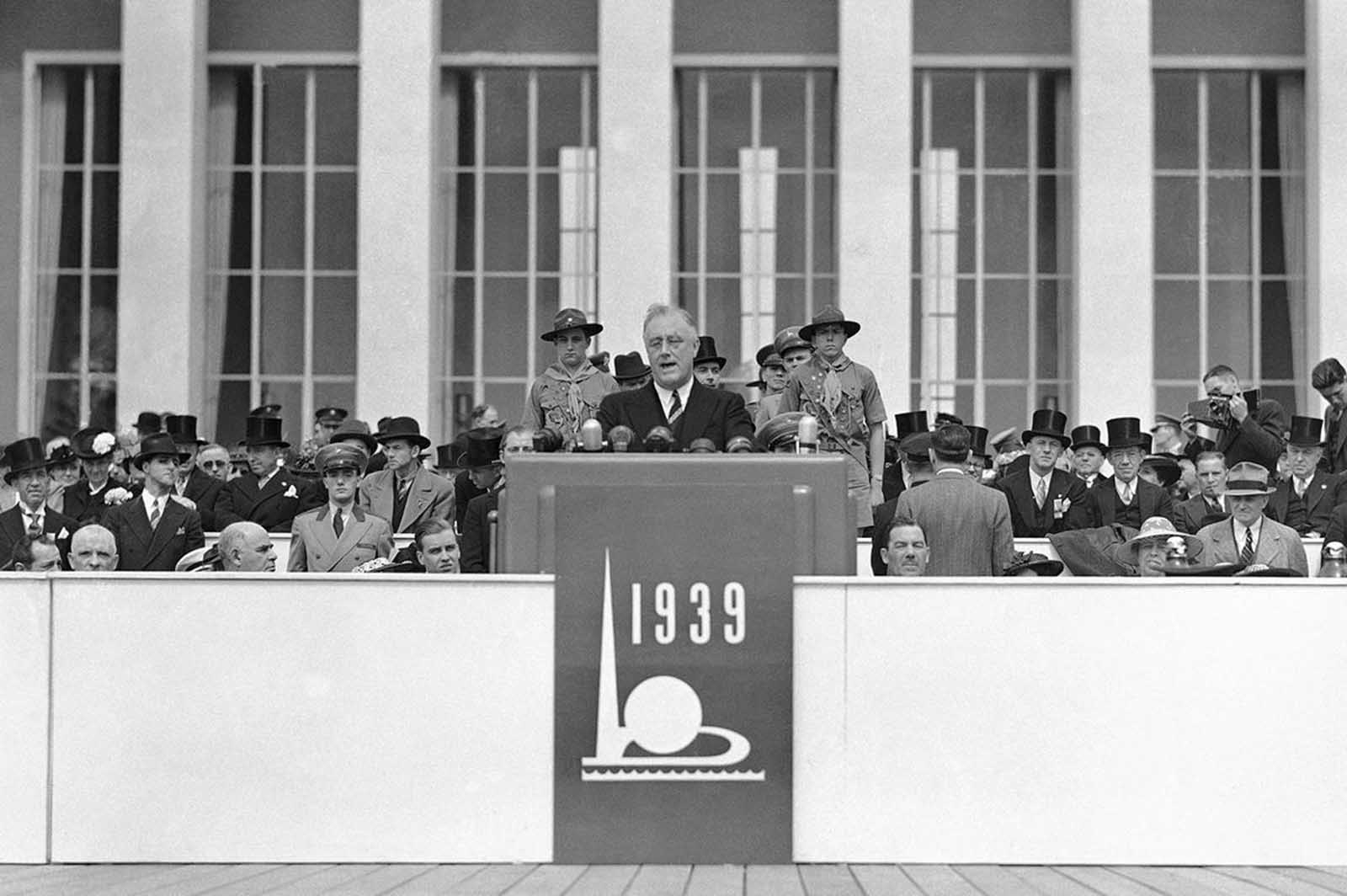 Flanked by Boy Scouts, President Franklin D. Roosevelt opened New York's $160,000,000 World's Fair with an address in which he said America has 