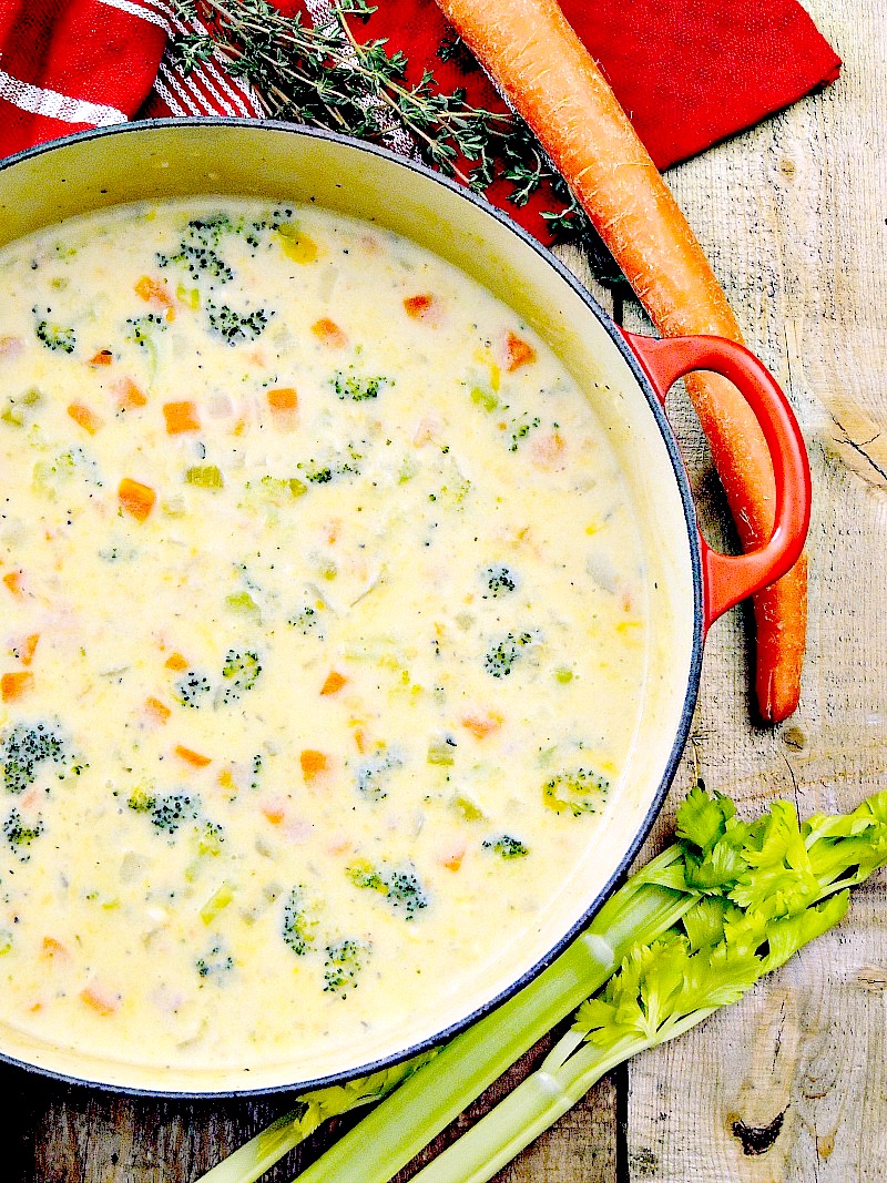 This Cheesy Ham and Vegetable Chowder recipe is easy to make, rich and creamy, cheesy, and loaded with veggies. It is comfort food at it's finest! #ham #pork #vegetables #cheesy #soup #chowder #easy #recipe | bobbiskozykitchen.com