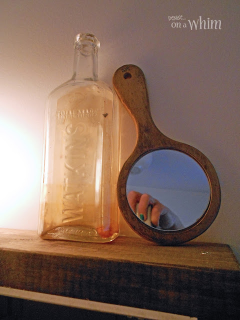 Medicine Bottle and Handlheld Mirror on Framed Medicine Cabinet | Vintage Farmhouse Bathroom Makeover | Denise on a Whim
