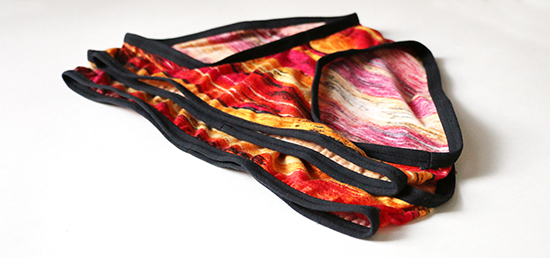Unfolded red, orange and black Acacia panties from MN2402