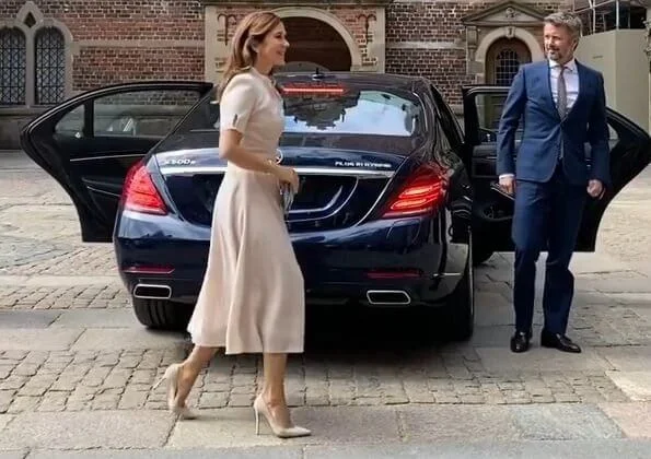 Crown Princess Mary wore a new puff-sleeve belted wool dress by Beulah London. Beulah Ahana midi dress. Queen Margrethe and Crown Prince Frederik