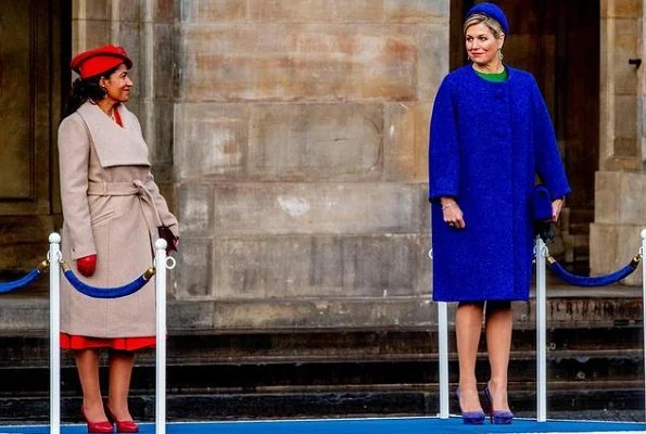 Queen Maxima wore Natan coat from Fall Winter collection and Natan green dress. First Lady Lígia Dias Fonseca