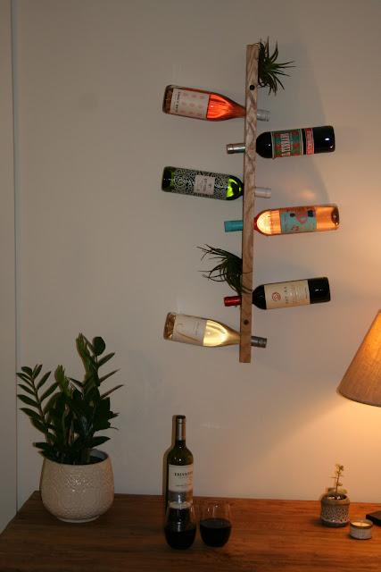 Buffet and vertical floating wine bottle holder with air plants | The Lowcountry Lady