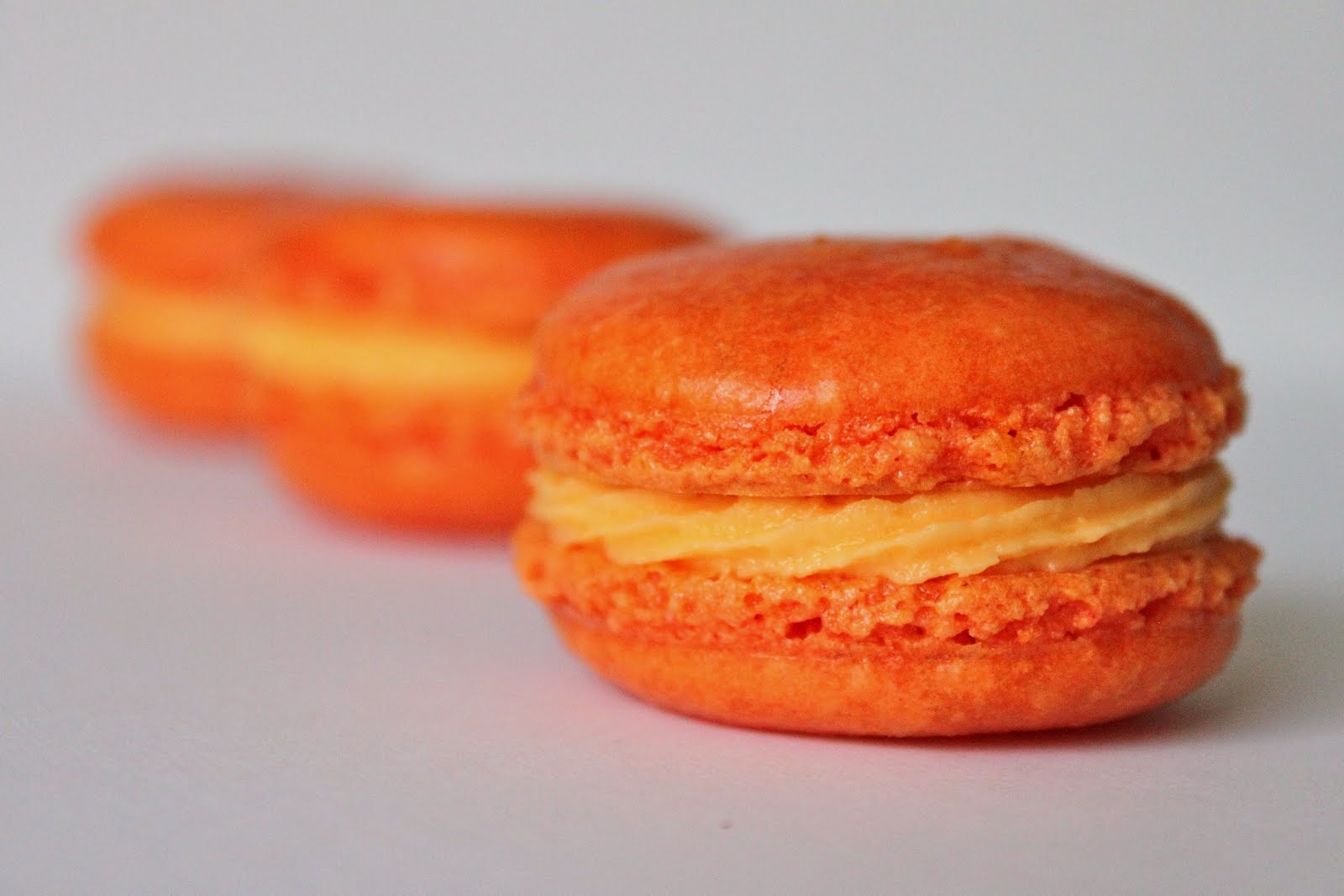 Baked Perfection: Orange Macarons with Creamsicle Frosting