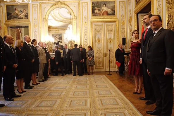 Queen Letizia of Spain and King Felipe VI of Spain attends for the State Dinner hosted by French President François Hollande at the Elysee Palace