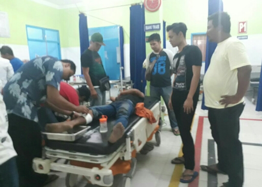 Tersangka saat berada di rumah sakit Tersangka saat berada di rumah sakit