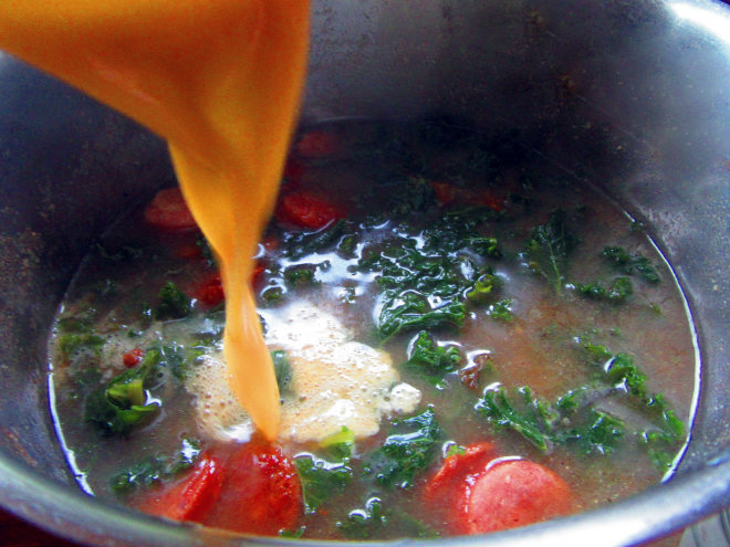 Cornmeal soup with collard greens and sausage by Laka kuharica: return mixture to the pot and stir