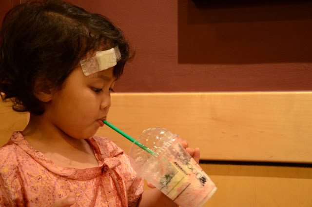 Kecil sipping coffee