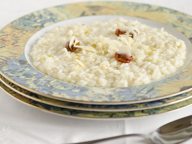 Risotto con formaggio di fossa di bufala e datterini