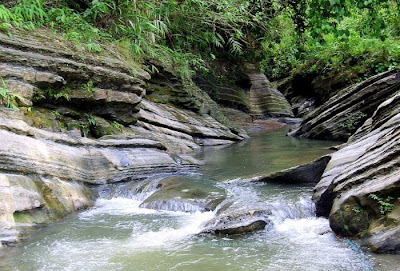 Rocky canal of falling water near Madhabkunda