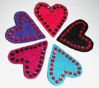 Sequinned heart brooches