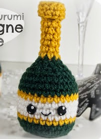 http://translate.google.es/translate?hl=es&sl=en&tl=es&u=http%3A%2F%2Fblog.craftyalien.com%2F2013%2F01%2Fcrochet-amigurumi-champagne-bottle.html%23.U2XEi3Z7Q1Y