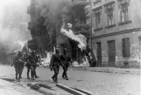 GERMAN TROOPS BURN DOWN WARSAW GHETTO - - WARSAW GHETTO UPRISING