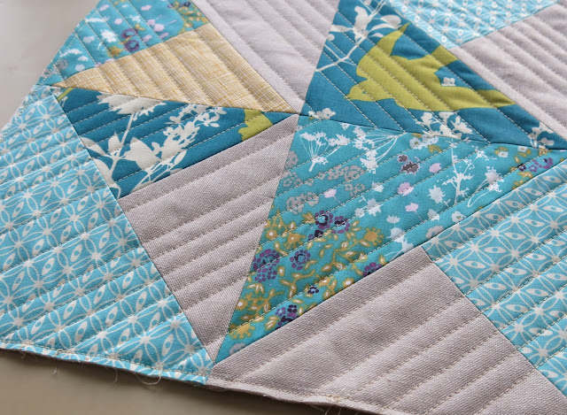 Teal and mustard yellow quilted cushions - Straight lines quilting