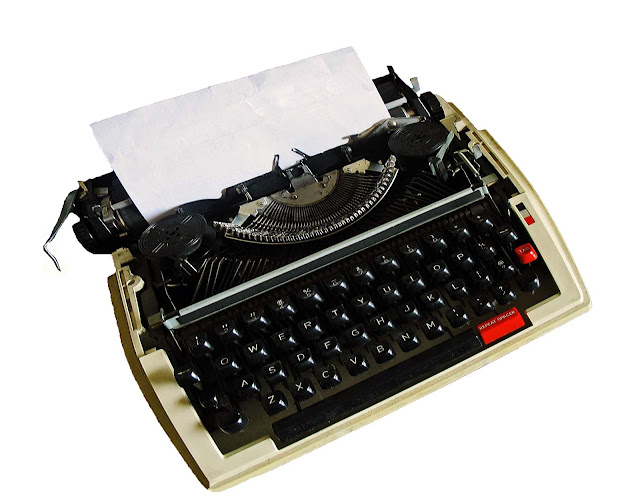 typewriter against white background