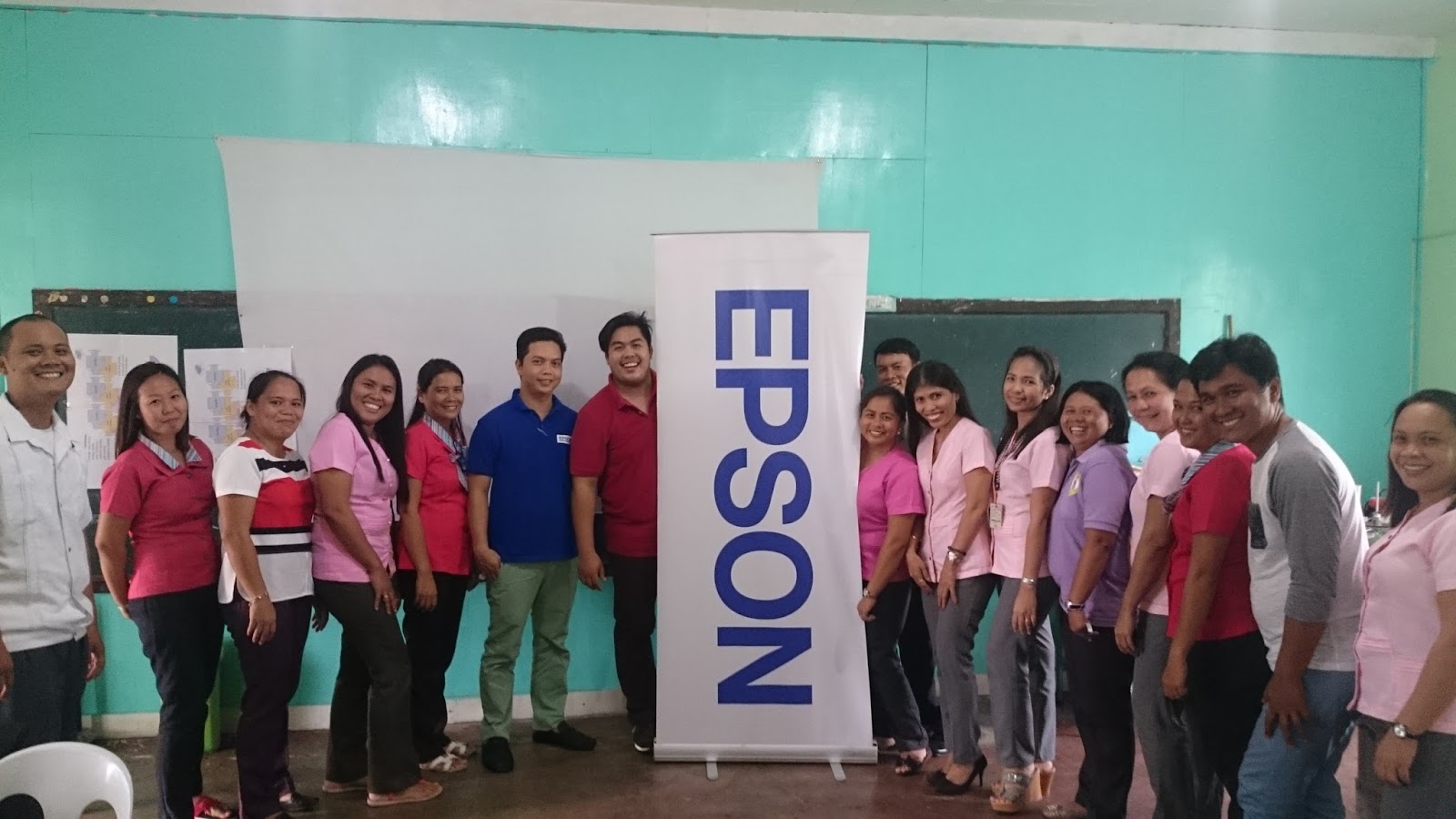 Calumboyan National High School faculty members with the Epson technical team
