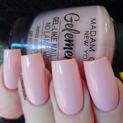A swatch photo showing two coats of Madam Glam "Pop Quiz," a light pink creme polish
